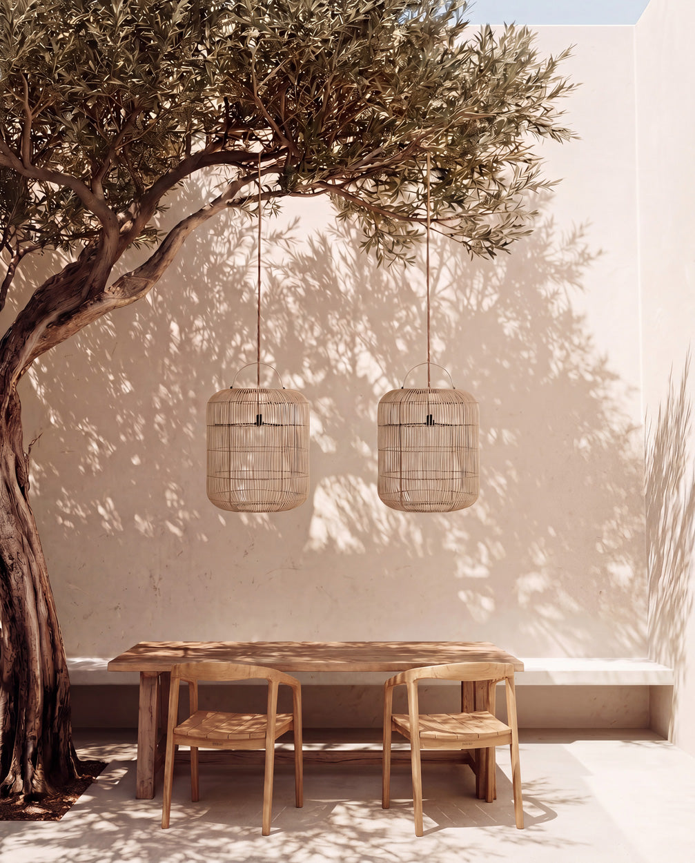Bozelo Rattan Pendant Light – Natural, Medium — three pendants above a dining table