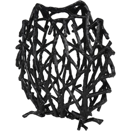 Angled view of the black branch sculpture showing its shallow depth and overlapping open metalwork.
