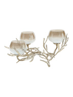 Side view of the branching tealight holder, showing three rounded glass cups and curved gold-toned stems.