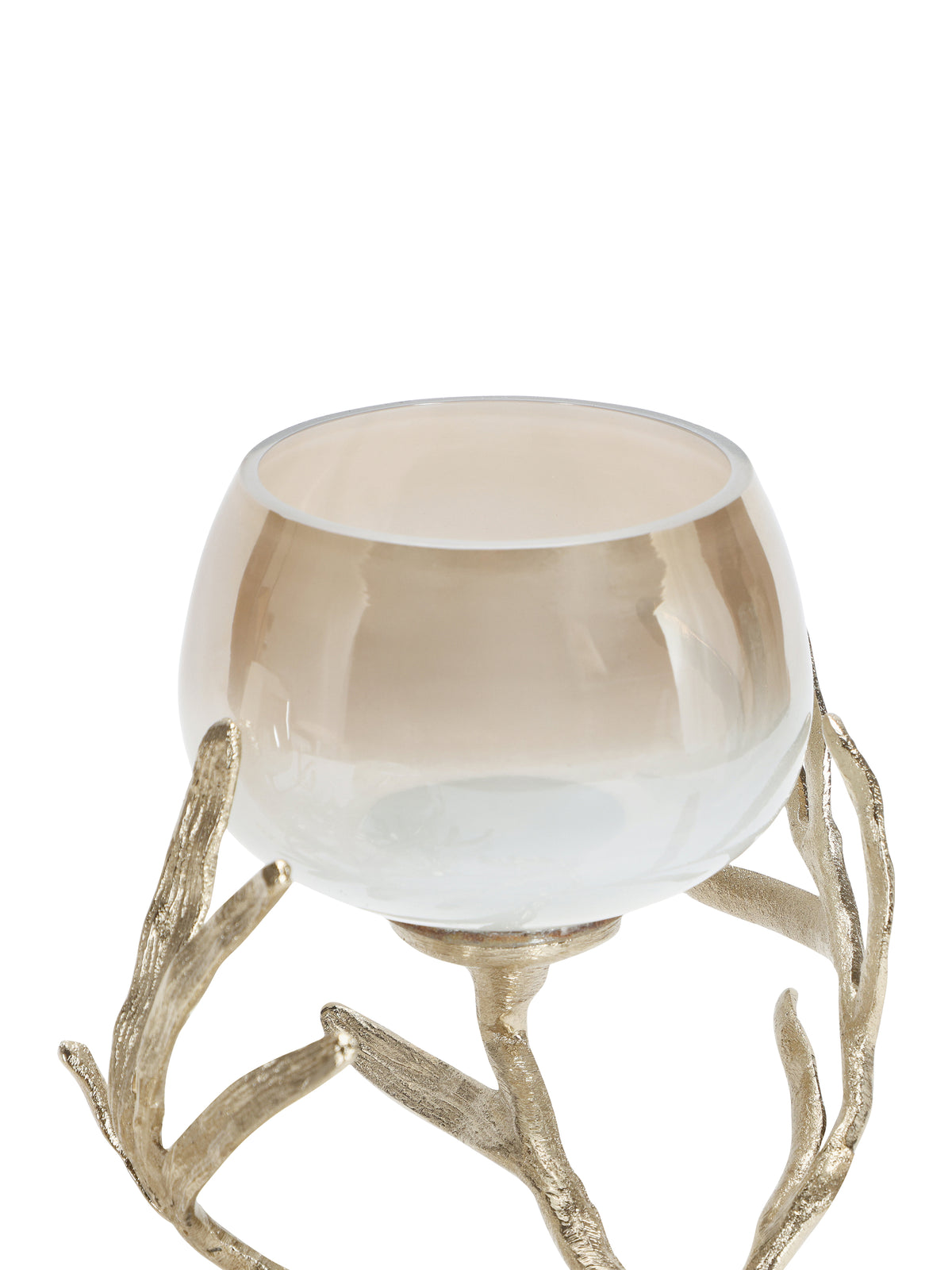 Close-up of a rounded glass vessel fading from champagne at the rim to frosted white, surrounded by textured branches.