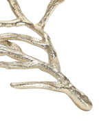 Close-up of the gold-toned branching base, showing its textured surface and rounded branch tips.