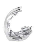 Silver wave sculpture on a white background, with a tall curling crest and rippled lower section.