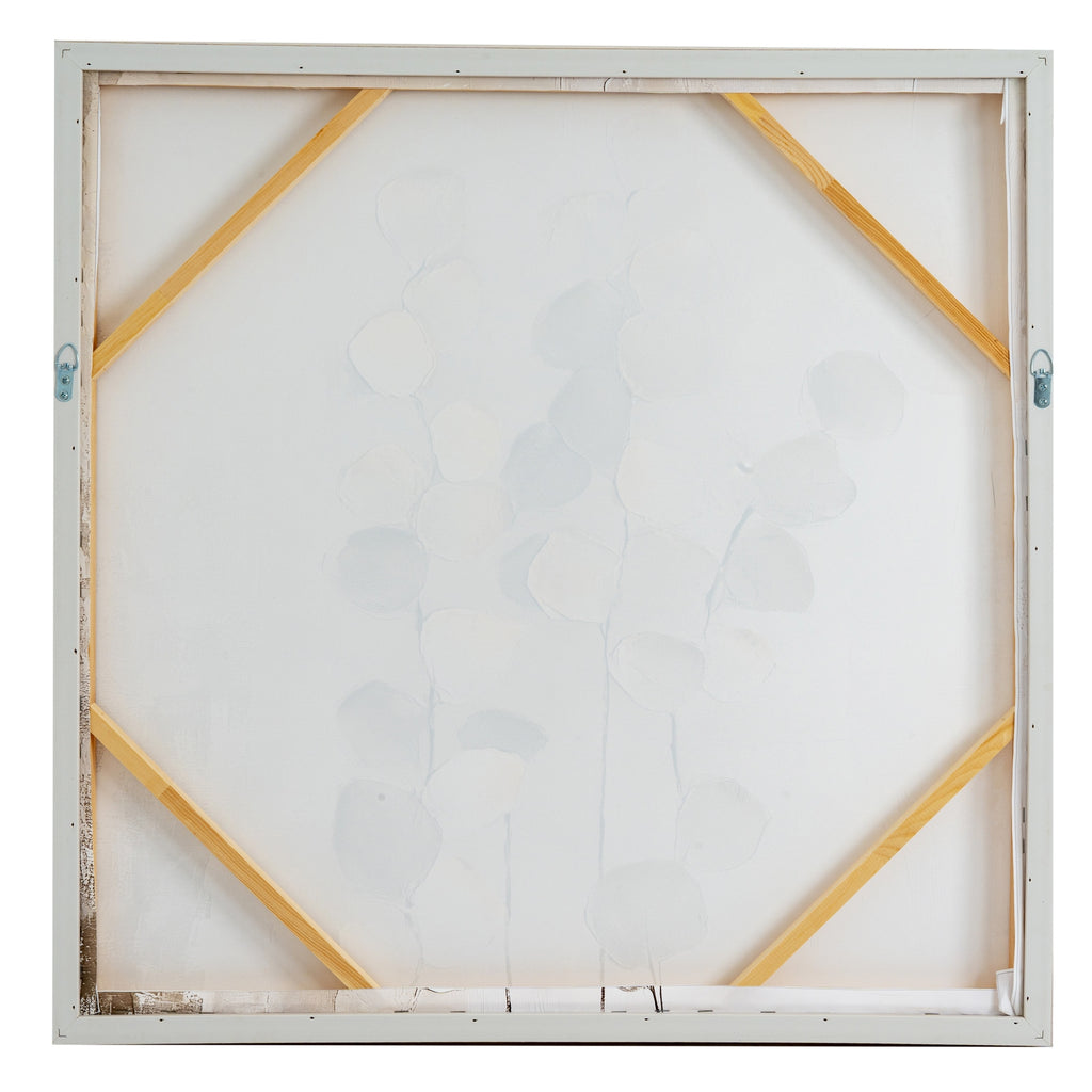 Rear view of the square artwork, showing a pale canvas back, diagonal corner braces and two loop fittings on the sides.