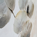 Close-up of grey and cream leaf forms with fine dark veins, visible canvas texture and glossy raised edges.