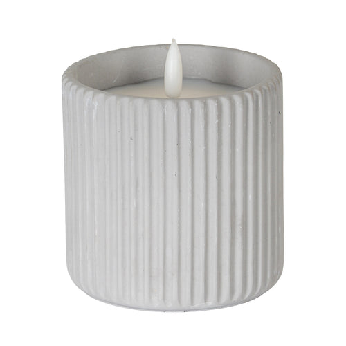 Pale grey cylindrical LED candle with vertical ribs, an inset pale top and a white flame-shaped detail against a white background.