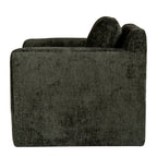 Side view of the olive-green armchair showing its deep side panel, rounded arm and angled back cushion.