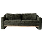 Straight-on view of the olive-green sofa with two seat cushions, two back cushions and a pale brown rail beneath the seat.