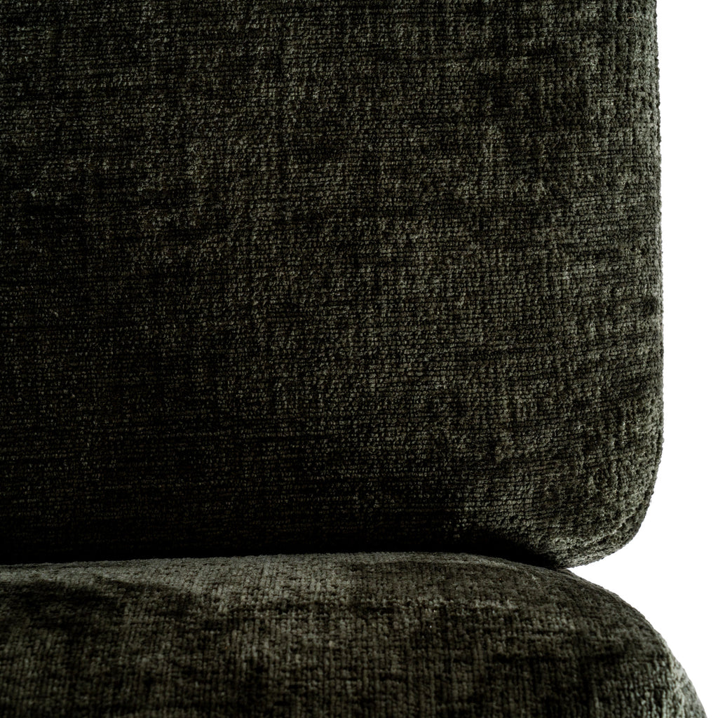 Close-up of the textured olive-green back cushion and seat cushion, showing variations in the surface colour.