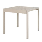 Pale putty dining table viewed at an angle, showing its broad slatted top, thick rectangular frame and four straight square legs.