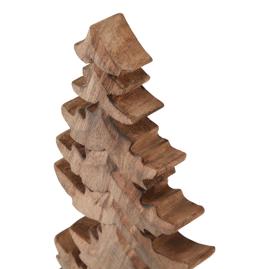 Angled close-up of the tree ornament's upper tiers, showing grain-like markings and the depth of the curved branch edges.