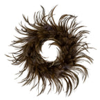 Full view of a brown decorative ring with an open centre and long feather-like tips spreading around its edge.