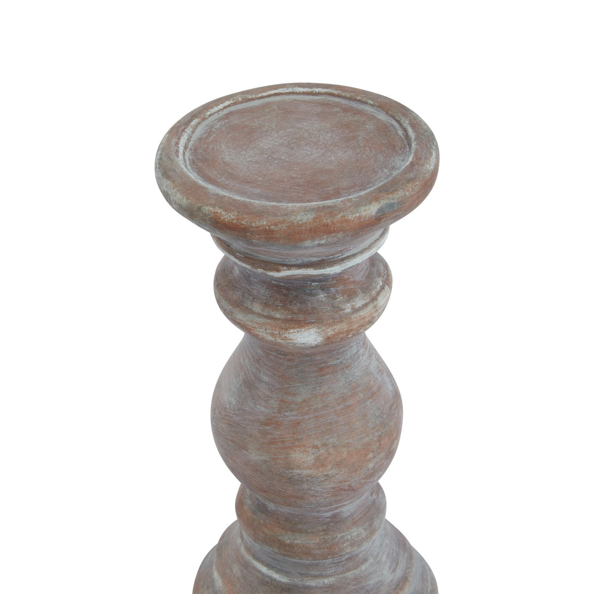 View from above of the candle holder's shallow circular dish and rounded rim, with pale markings across the brown surface.