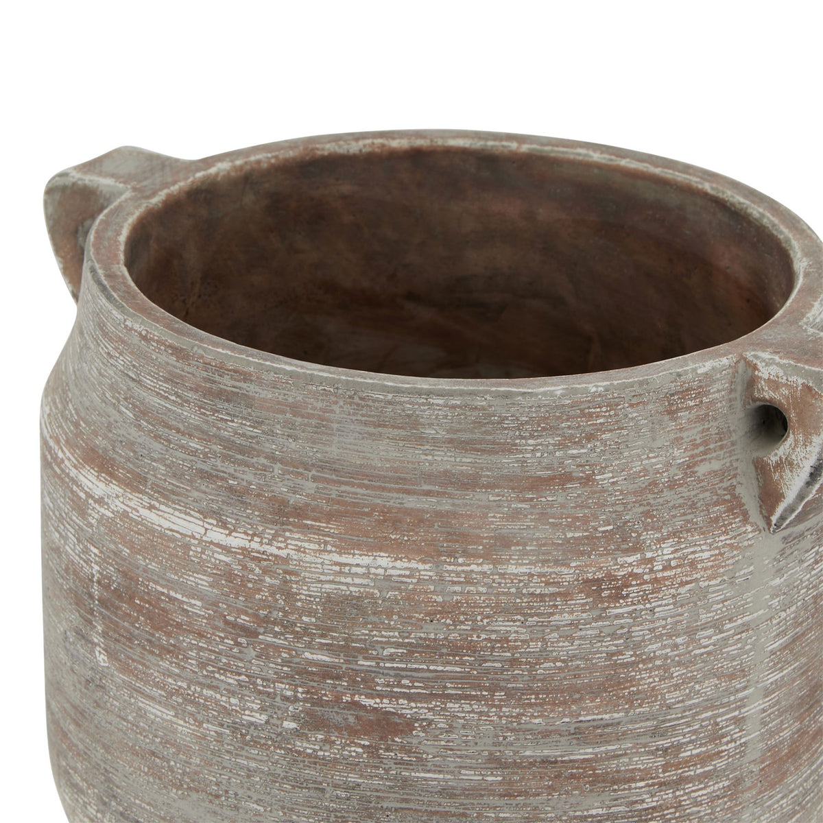 Angled close-up of the vase mouth showing the brown interior, pale rim and textured upper sides.