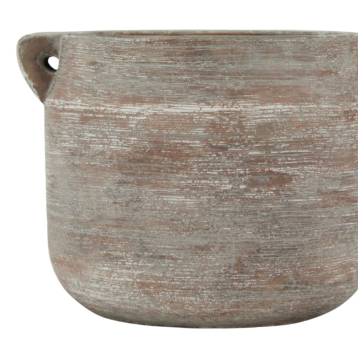 Close-up of the vase body showing fine horizontal striations, patches of pale weathered colour and the left loop handle.