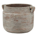 Brown striated vase with rounded sides, a broad open mouth and two small loop handles against a white background.