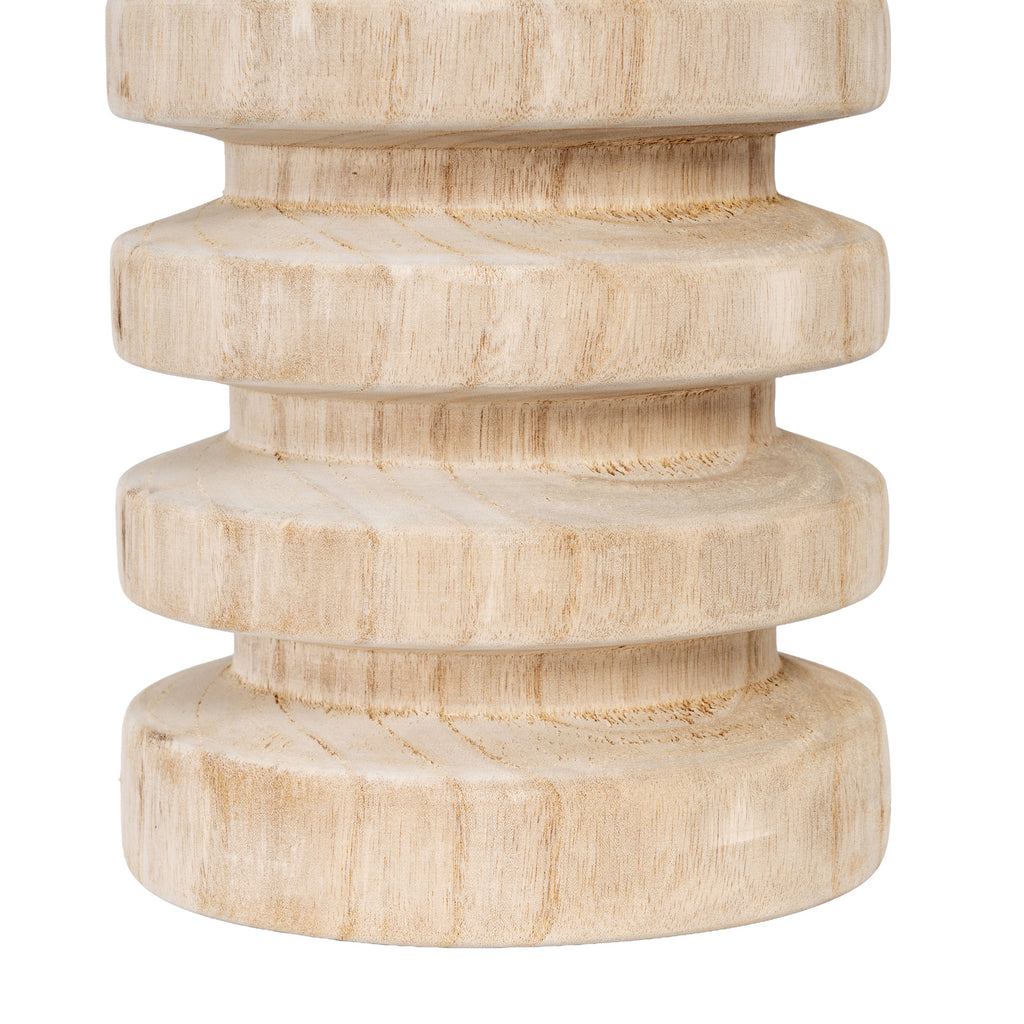 Close-up of the vase's broad horizontal ribs and recessed bands, showing fine texture and curved brown markings.