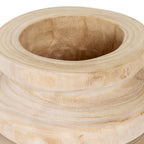 Angled close-up into the vase's hollow opening, showing its thick rounded rim, brown grain and curved neck.