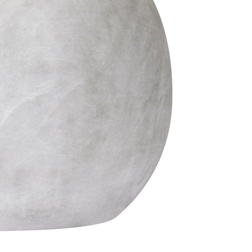 Close-up of the Brushed Orb Vase's curved side, showing faint brushed-looking marks and soft grey-white tonal variation.