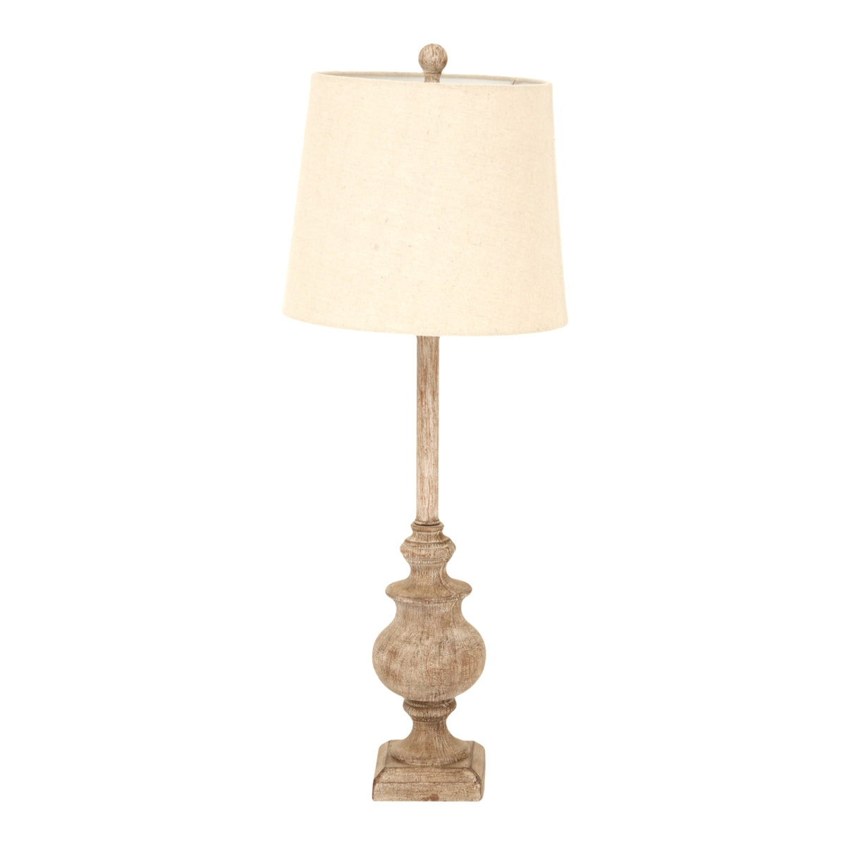 Full view of a candlestick-form table lamp with a pale tapered shade, slender brown stem, bulbous lower section and square foot.