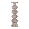 Pale beige-grey candle holder with brown flecks, four rounded sections, a broad top dish and a stepped round base against white.