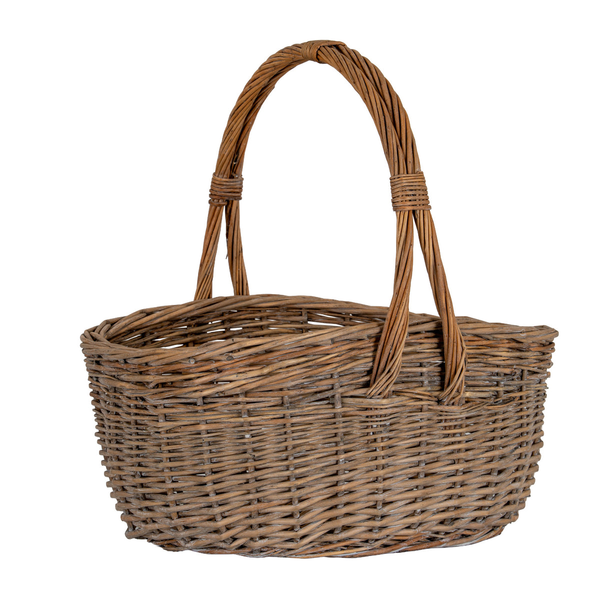 Brown woven trug basket viewed from the front at a slight angle, showing the curved rim and bundled handle ends extending down the basket side.