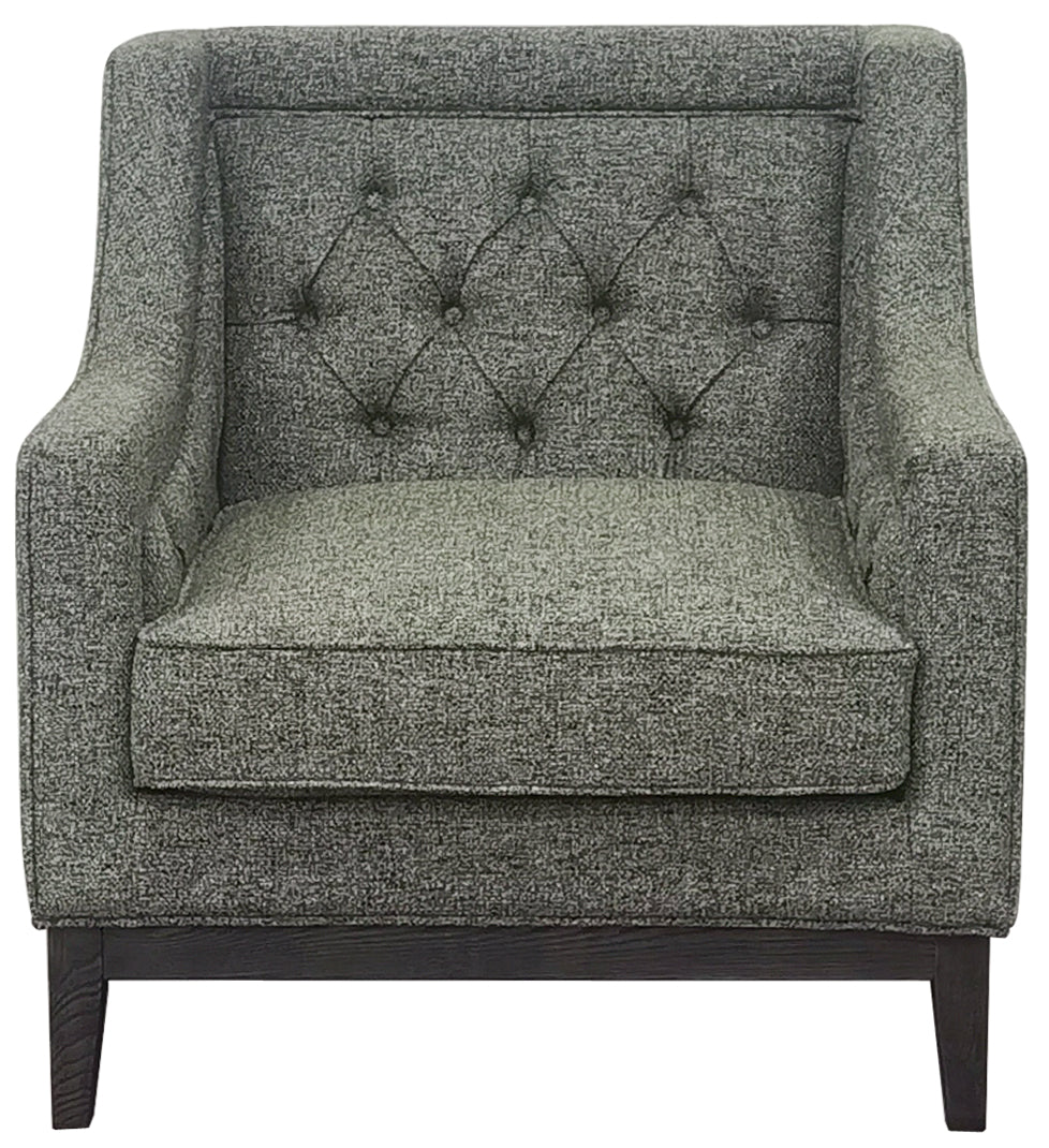 Front view of a green woven armchair with a diamond-buttoned back, deep seat cushion and dark wooden base.
