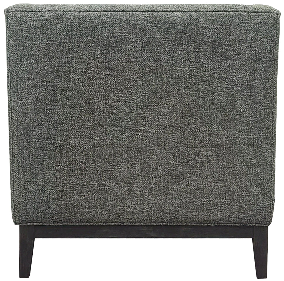 Rear view of the armchair showing the plain textured green upholstered back and dark wooden base and legs.