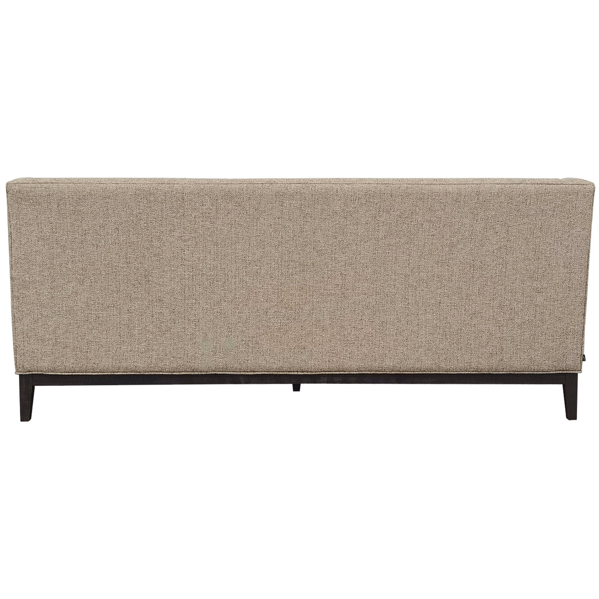 Rear view of the sofa with a plain taupe upholstered back, piped edges and dark wooden base.
