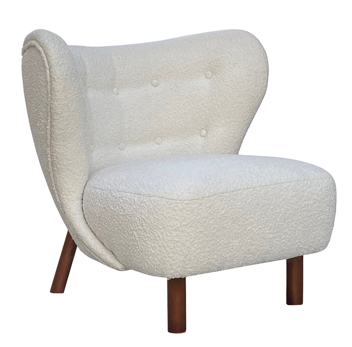 Front three-quarter view of the cream bouclé chair showing the curved buttoned back, piped edges and stained wooden legs.