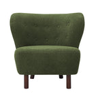 Front view of a green bouclé armless chair with a buttoned wingback, rounded seat and brown wooden legs.