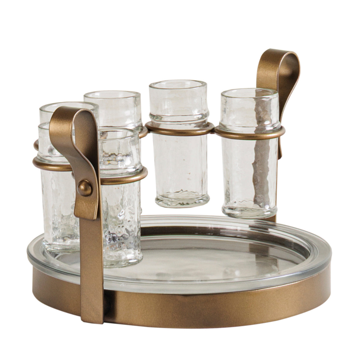 Angled view of the shot set showing the circular glass arrangement, raised holders and broad ribbon-shaped carrying handle.