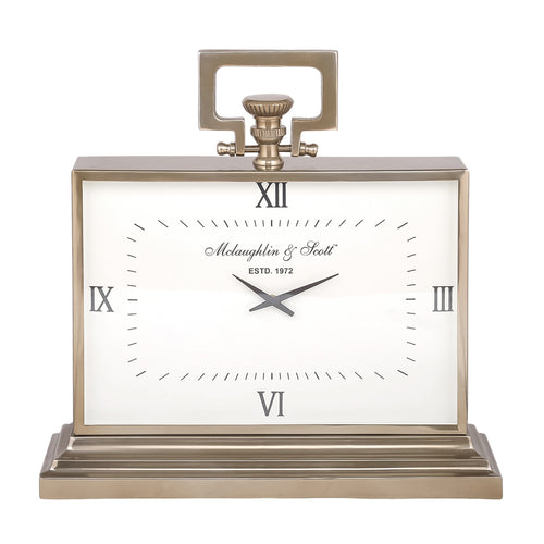 Front view of the large brass-finish carriage clock with a white rectangular dial, black Roman numerals and stepped base.