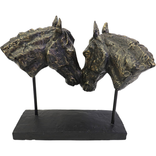 Reverse view of the paired horse head sculpture, showing rough neck surfaces and the low rectangular black base.