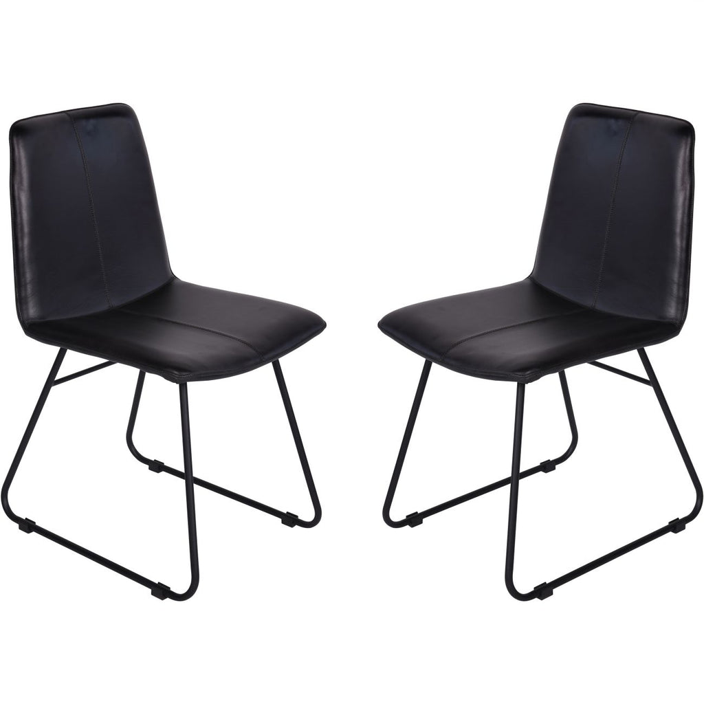 Pair of charcoal leather dining chairs angled towards each other, with central stitching and black tubular frames.