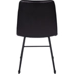 Rear view of the charcoal dining chair with a plain upholstered back and a horizontal bar between the black frame tubes.