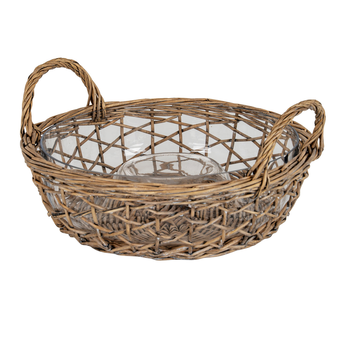Angled view of an empty transparent round dish with a central circular well, sitting in a brown open-lattice carrier with two loop handles and a densely woven base.