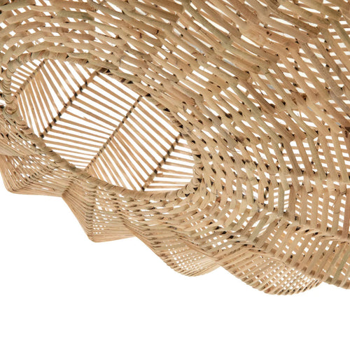 Inside view of the Cerise pendant's star-shaped natural rattan weave