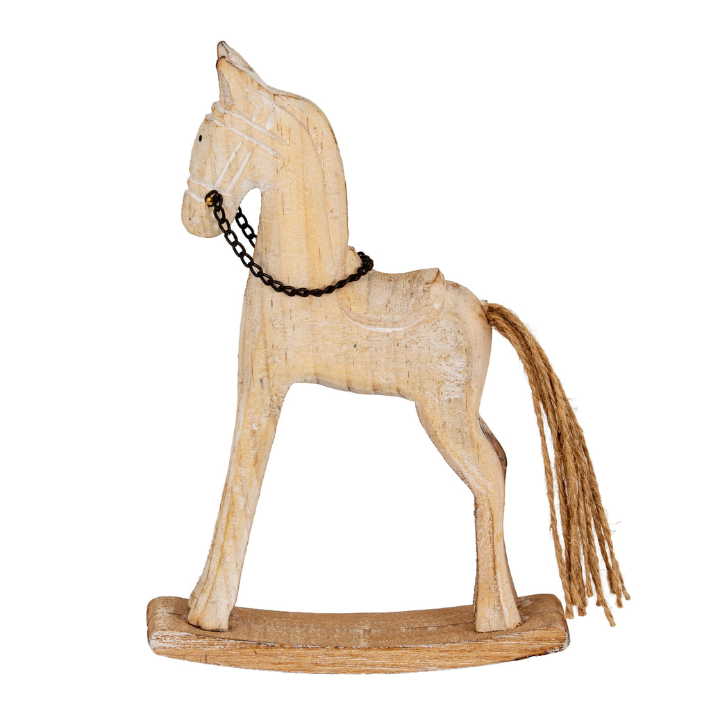 Side view of the rocking-horse decoration showing its long legs, saddle outline and loose twine tail above the curved rocker.
