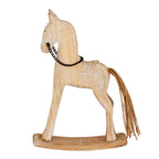 Side view of the rocking-horse decoration showing its long legs, saddle outline and loose twine tail above the curved rocker.