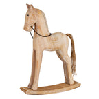 Pale rocking horse decoration viewed at an angle, with a dark chain bridle, long brown twine tail and curved rocker base.