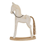 Side view of the whitewashed horse facing left, showing its slender legs, long twine tail and curved rocker base.