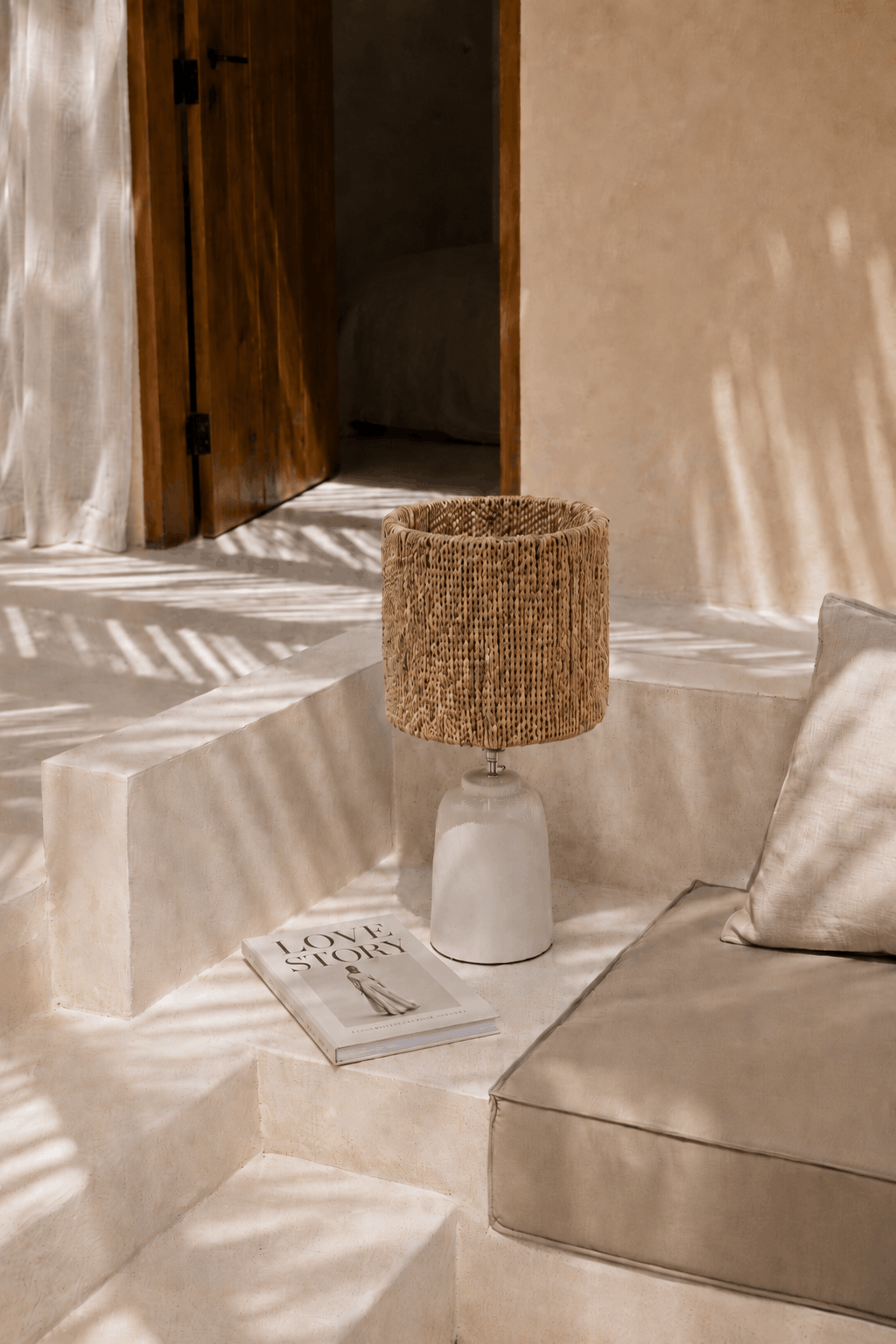 Chalki Seagrass Table Lamp Shade – Natural – styled on a bedside table