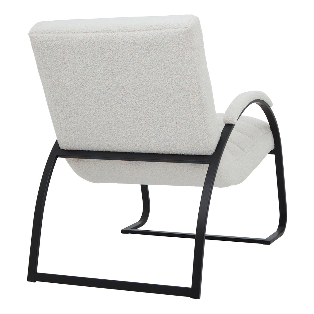 Rear three-quarter view showing the chair's plain loop-textured back, pale arm cap and open black frame beneath the seat.