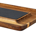 Close-up of a rounded tray corner, the curved recessed channel and the textured edge of the charcoal insert.