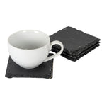White cup resting on a charcoal square coaster, with three matching coasters stacked behind it on a white background.