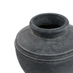 Angled close-up looking into the planter's open neck, showing the thick rounded rim and mottled grey shoulders.