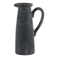 Tall charcoal-grey decorative jug with a tapered body, flared spout and long loop handle on a white background.