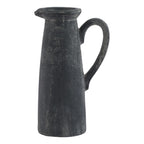 Tall charcoal-grey decorative jug with a tapered body, flared spout and long loop handle on a white background.