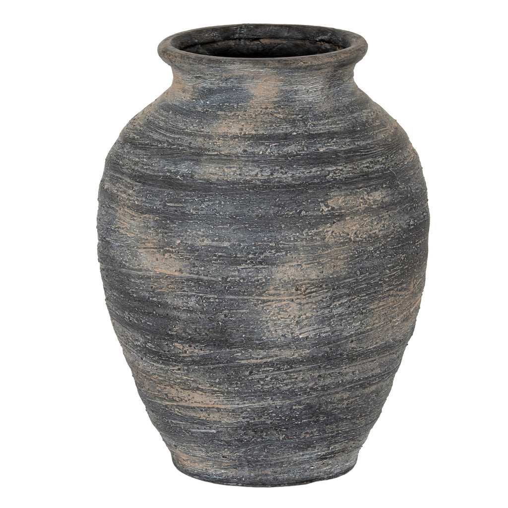 Full view of a charcoal-grey vase with a rounded body, short neck and flared rim, covered in fine horizontal lines and warm brown patches.