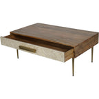 Coffee table viewed from above at an angle with the wide drawer open, showing its wood interior and patterned front.